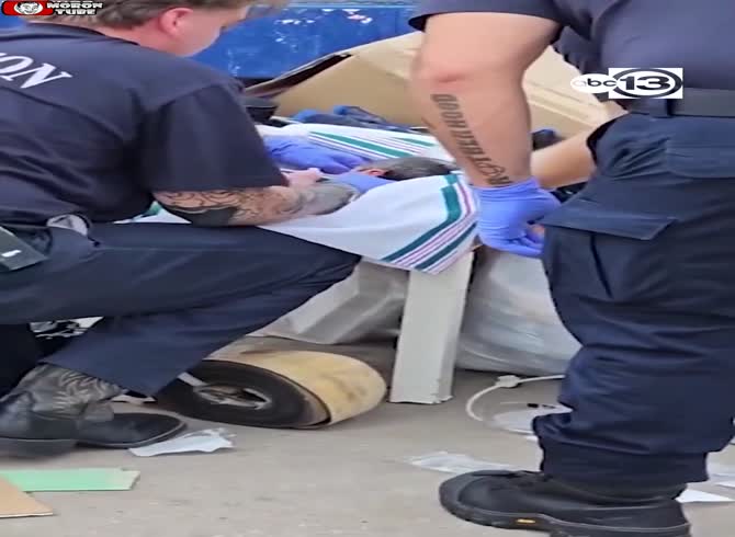 Video :A baby dumped into a garbage is rescued by Houston police